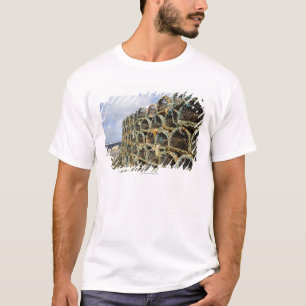 pile of lobster crab pots on Irish shoreline T-Shirt