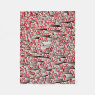 Pile of rolled papers fleece blanket