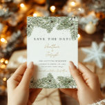 Pine & Gold Christmas Foliage Wedding save the dat Invitation<br><div class="desc">Discover the magic of the season with our Winter Pine & Gold Flecks Festive Christmas Wedding Invitations and Decor collection. Bring the enchantment of a winter wonderland to your special day with these elegant designs adorned with glistening gold flecks and the timeless beauty of pine. Set the stage for a...</div>