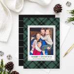 Pine Green Tartan Plaid Merry Christmas Photo Holiday Card<br><div class="desc">Festive winter plaid photo card features a favourite vertical photo framed by a classic yet modern hunter green / pine green and black Scottish tartan plaid patterned background. Personalise the custom "Merry Christmas" text with your preferred wording, family name, and the year. A coordinating pattern of sleek black and white...</div>