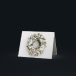 Pine Wreath Folded Christmas Holiday Card<br><div class="desc">Beautiful white and gold Christmas tree ornaments and flowers on a snow flocked pine wreath,  your personalised greeting and names are featured on a gold background on the inside of these folded holiday greeting cards. (Larger 5" x 7" card in our store.)</div>