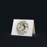 Pine Wreath Folded Christmas Holiday Card<br><div class="desc">Beautiful white and gold Christmas tree ornaments and flowers on a snow flocked pine wreath,  your personalised greeting and names are featured on a gold background on the inside of these folded holiday greeting cards. *ADD a photo on the top inside,  too.</div>