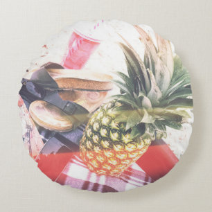 Pineapple beside phone and speaker round cushion