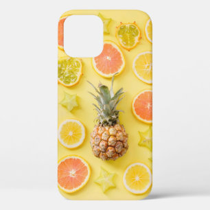 Pineapple surrounded by citrus fruits iPhone 12 case