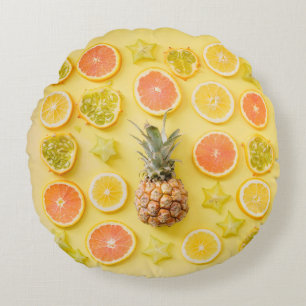 Pineapple surrounded by citrus fruits round cushion