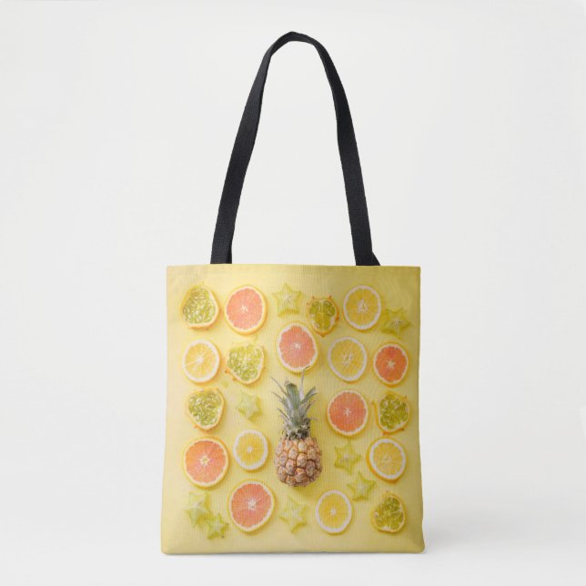 Pineapple surrounded by citrus fruits tote bag (Front)