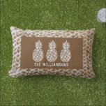 Pineapples Personalised Outdoor Lumbar Cushion<br><div class="desc">Three pineapples accent this outdoor lumbar pillow,  great for your home or a gift for a new homeowner personalised with your family name on a woven wood print pattern. (Not actual wood,  it is an illustration printed in full colour.)</div>