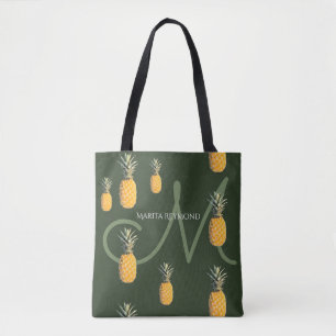 pineapples with name and initial on dark-green tote bag
