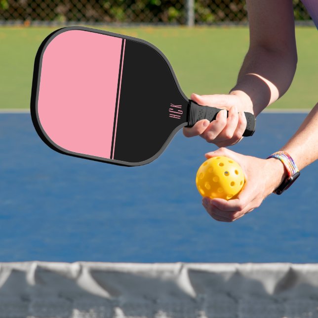 Pink and black modern split-screen design pickleball paddle (Insitu)