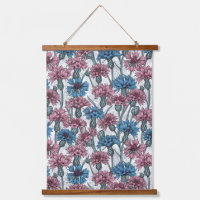 Pink and blue cornflowers on white