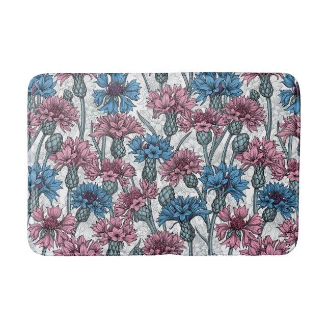 Pink and blue cornflowers, wild flowers on white bath mat (Front)