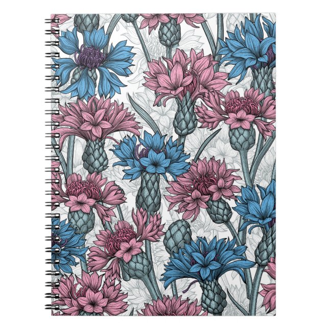 Pink and blue cornflowers, wild flowers on white notebook (Front)