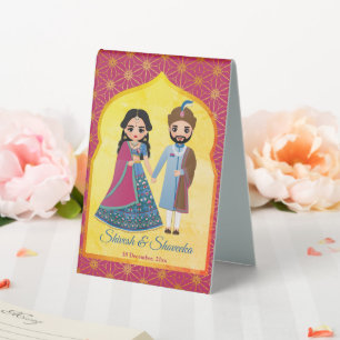 Pink and gold design border with Indian couple 