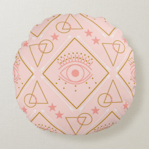 Pink and gold eyes and geometric elements in a sea round cushion
