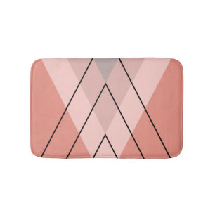 Pink and grey triangles on pink background bath mat