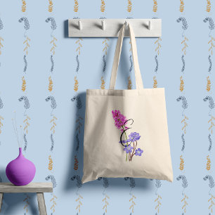 Pink and lilac wildflowers with your initial. tote bag