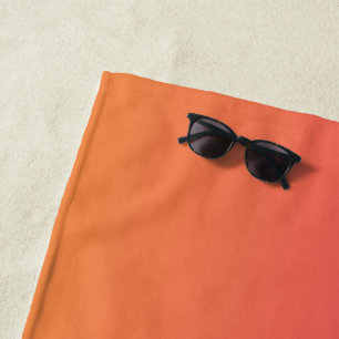 Pink and orange gradient beach towel