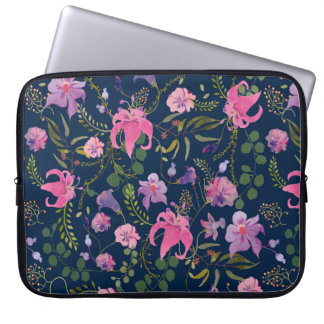 Pink and violet flowers with green leaves on the d laptop sleeve