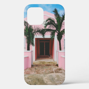 Pink and white concrete house near green trees und iPhone 12 case