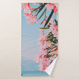 Pink and white petaled flowers bath towel