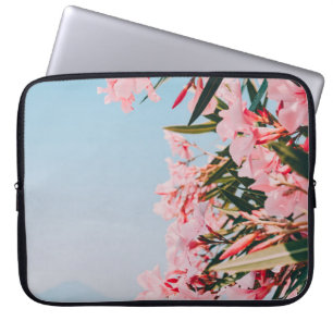 Pink and white petaled flowers laptop sleeve