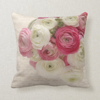 Pink and white ranunculus on script cushion