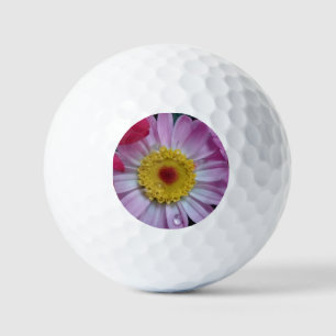 Pink and yellow flower golf balls