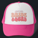 Pink Bachelorette Party Bride Squad Bridesmaid Trucker Hat<br><div class="desc">Make a splash at your upcoming bachelorette party with this stunning retro bachelorette party personalised merchandise. Whether you're celebrating a bach trip, a girls' vacation, or a best friends' holiday, this custom groovy bachelorette party merchandise is the perfect addition to your unforgettable getaway. Add a personal touch to your bachelorette...</div>