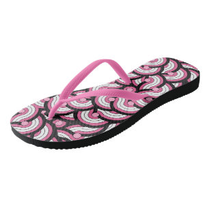 pink, black and white geometric flip flops