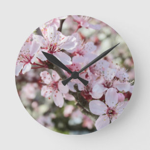 Pink Blossoms Red Stems. Round Clock