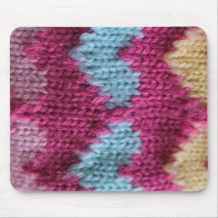 pink, blue and yellow knitting mouse mat