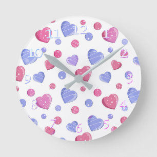Pink, blue hearts on a white background. round clock