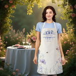 Pink blue wildflowers bees apron<br><div class="desc">A boho style apron. A beige,  cream coloured background. Decorated with watercolored pink and blue wildflowers and bees. Personalise and add your name and a text.  Kitchen utensils framing the name.</div>