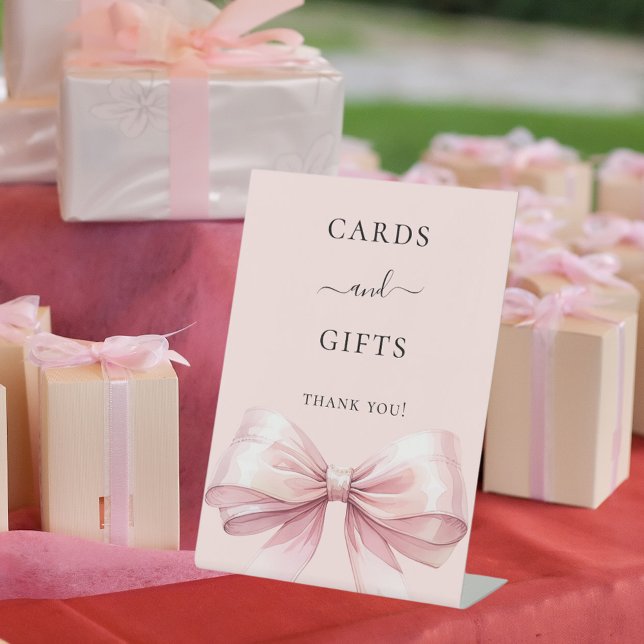 Pink bow cards gifts sign (Creator Uploaded)