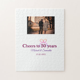 Pink bow cheers to 50 years anniversary wedding jigsaw puzzle