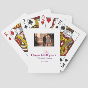 Pink bow cheers to 50 years anniversary wedding playing cards