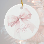 Pink Bow Monogram Christmas Ornament<br><div class="desc">Add a touch of elegance and femininity to your holiday decor with this beautiful Christmas ornament featuring a delicate pink bow and a personalised script initial monogram. The soft, girly design is perfect for bringing a cute and trendy accent to your Christmas tree. Easily customise with your initial for a...</div>
