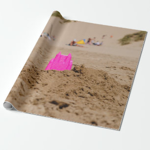 Pink castle toy in shore at daytime wrapping paper