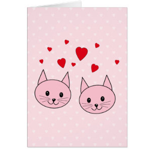 Pink cats with love hearts.