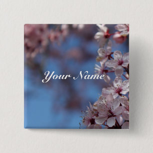 pink cherry blossom in blue sky 15 cm square badge
