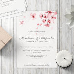 Pink Cherry Blossoms floral romantic wedding Invitation<br><div class="desc">A contemporary and elegant floral wedding invitation featuring a beautiful and delicate blush pink watercolor cherry blossom illustration complemented with dark grey calligraphy and serif fonts for a romantic yet modern look.</div>