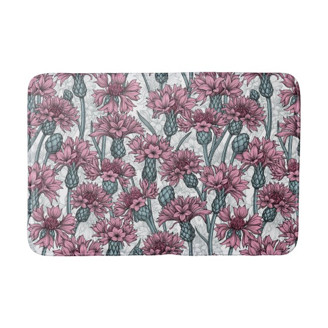 Pink cornflowers, wild flowers on white bath mat (Front)