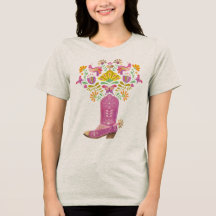 Pink Cowboy boot bursting with flora and fauna
