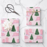 Pink Cowgirl Rodeo Hat Christmas Tree Wrapping Paper Sheet<br><div class="desc">Pink cowgirl rodeo Christmas design for the modern cowgirl. With a pink starry cowgirl hat,  pink starry cowgirl boots,  and a pine tree with star ornaments. Pink Christmas wrapping paper</div>