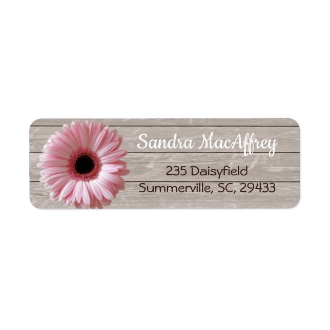 Pink daisy gerbera on light wood (Front)