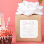Pink Elegant Hand Drawn Bow Thank You Wedding Square Sticker<br><div class="desc">Elegant thank you wedding favour stickers feature hand drawn ribbon bow with modern handwritten script fonts in soft blush pink. sweet and simple. Great for modern romantic wedding,  unique fun whimsical wedding,  elegant casual wedding.  
See all the matching pieces in collection.</div>