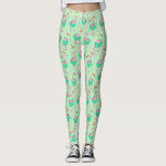 Pink Flamingo Ferns Tropical Green Summer Pattern Leggings<br><div class="desc">You'll be completely one-of-a-kind in these unique tropical flamingo leggings. Inspired by retro, stylised Art Deco motifs and themes from the Jazz Age, these all-over-print leggings have an original pink flamingo bird pattern with colourful ferns and geometric shapes. The design is made in shades of bright summer green with peachy...</div>