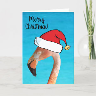 Pink Flamingo in red cartoon Santa hat Christmas Holiday Card