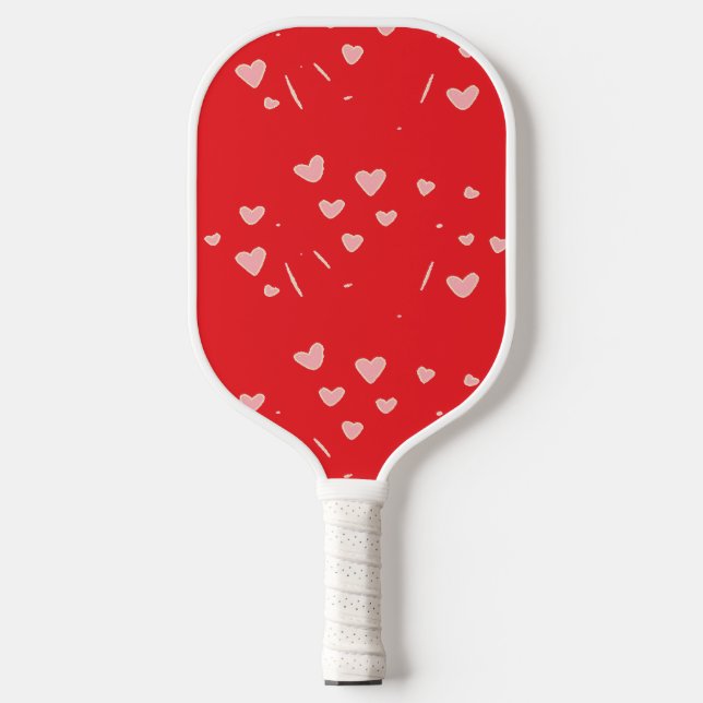 Pink floating hearts on red pickleball paddle (Front)