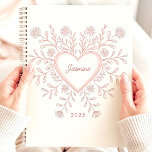 Pink Floral Heart 2025 Custom Name Planner<br><div class="desc">Embrace love and organisation with this charming planner featuring a heart-shaped floral design in delicate pink hues. Personalise it with your name for a unique and heartfelt touch. This planner is perfect for keeping track of appointments, to-dos, and all your important dates throughout 2025. With its lovely design and ample...</div>